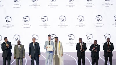 Sheikh Mohamed presents the 2023 Zayed Sustainability Prize for Europe & Central Asia Global High Schools to a representative from Germany's Romain-Rolland Gymnasium. Photo: UAE Presidential Court