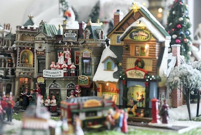 Robert Bradley has collected more than 250 festive miniatures over seven years. Khushnum Bhandari for The National