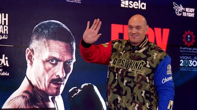 Tyson Fury arrives on stage. PA