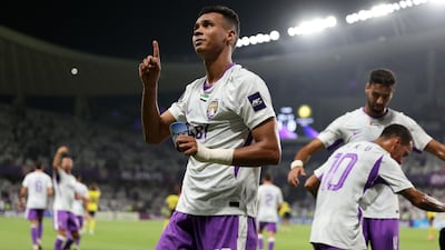 Houssine Rahimi points to the sky after scoring against Al Nassr. Chris Whiteoak / The National