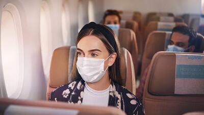 As Covid-19 restrictions around the world ease, some airlines have changed their policies on face masks. Photo: Etihad