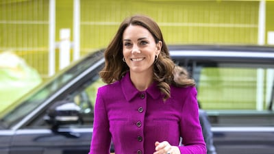 The Duchess of Cambridge wears a pink Oscar de la Renta suit for a visit to the Royal Opera House in London on January 16. The suit is paired with Rupert Sanderson pumps, an Aspinal Midi Mayfair bag and Asprey Oak Leaf earrings. Getty Images