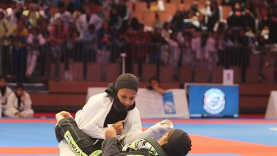 Alia Mohammed Salem (on top) of the UAE shown in her match with Lolwa al Shamsi of the UAE in the Abu Dhabi World Youth Jiu-Jitsu Championship 2016. Ravindranath / The National