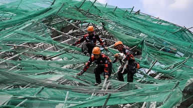 The precarious rescue mission continues in Angeles, the Philippines, a day after the building under construction collapsed. Reuters
