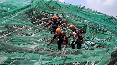 The precarious rescue mission continues in Angeles, the Philippines, a day after the building under construction collapsed. Reuters