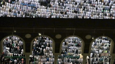 Muslim pilgrims perform prayers at the Grand Mosque in Saudi Arabia's holy city of Mecca prior to the start of the annual Hajj pilgrimage. Karim Sahib / AFP
