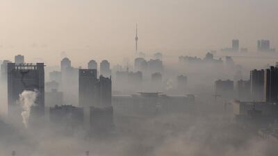Buildings are seen amid heavy fog in Wuhan, Hubei province, China. Reuters