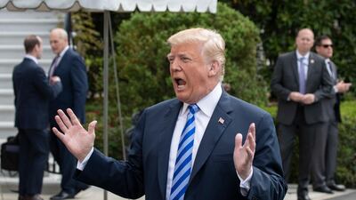President Donald Trump tells reporters a time and place for his meeting with North Korea's Kim Jong Un has been set and will be announced soon. J. Scott Applewhite / AP Photo