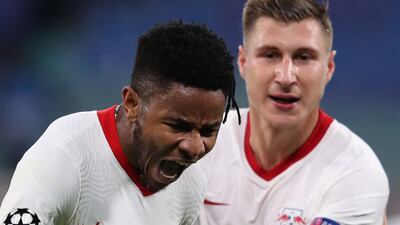 Leipzig's French midfielder Christopher Nkunku (L) after his goal. AFP