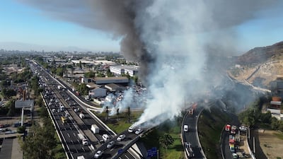 Smoke rises from the site of a gas lorry explosion in Santiago, Chile. AFP