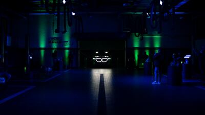 The XM moves in from the darkness.