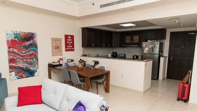 The apartment has an open-plan kitchen