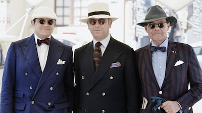 Heritage tailoring at its best, care of our time-hopping train conductors. Who cares if the temps were in the 80s? These lads went all out and didnÕt even show a single bead of sweat. Photos by Enrico Labriola / Pitti Immagine