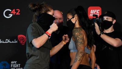 Sarah Moras of Canada and Vanessa Melo of Brazil face off during the UFC weigh-in at Etihad Arena on UFC Fight Island. Jeff Bottari / Zuffa LLC / Getty Images / UFC