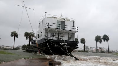 The Oceanis is grounded by a tidal surge at the Port St Joe Marina, Florida. AP Photo