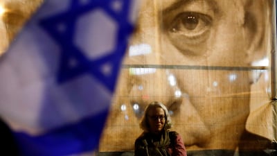 A woman during a demonstration in Tel Aviv last month against proposed judicial reforms by Israel's new right-wing government. Reuters