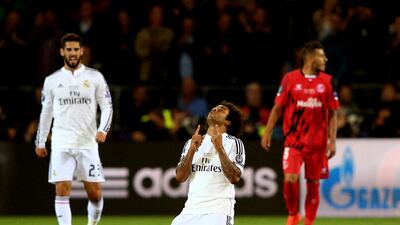 Marcelo celebrates his team's victory in the Uefa Super Cup in 2014. Getty
