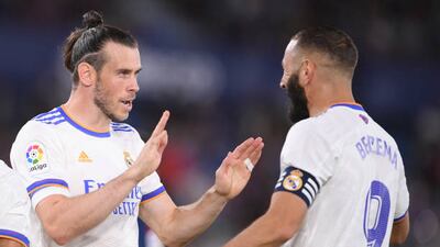 Gareth Bale celebrates with Karim Benzema after giving Real Madrid the lead against Levante in Valencia. Getty