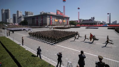 Korean People's Army (KPA) soldiers march during a military parade and mass rally on Kim Il Sung square in Pyongyang. AFP