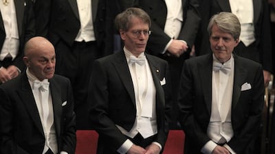 From left, Eugene Fama, Lars Hansen and Robert Shiller accept the 2013 Nobel. Frank Augstein / AP Photo