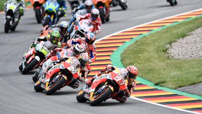 Spanish MotoGP rider Marc Marquez leads the pack during the German MotoGP race at the Sachsenring racing circuit in Hohenstein-Ernstthal. Filip Singer / EPA