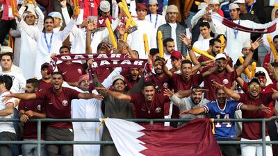 Qatar supporters cheer during the AFC Asian Cup final football match between Japan and Qatar. Karim Sahib / AFP