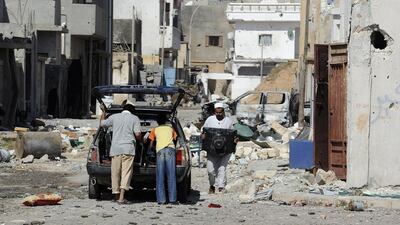 A Sirte neighbourhood following heavy fighting in 2011. Philippe Desmazes / AFP