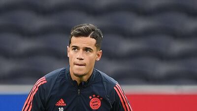 Bayern Munich's Brazilian midfielder Philippe Coutinho stretches. AFP