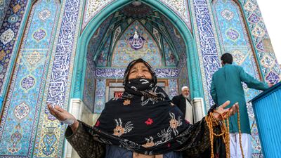 A woman visits a shrine in Kabul, Afghanistan, to celebrate Nowruz, the Iranian new year. EPA