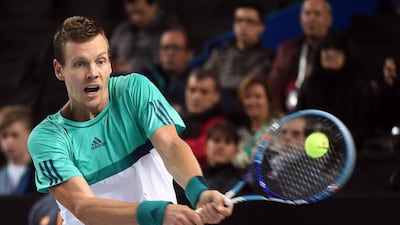 Czech player Tomas Berdych returns the ball to Belgian David Goffin during their tennis match final quarter at the ATP Marseille Open 13 Provence in Marseille, southeastern France, on February 19, 2016. / AFP / ANNE-CHRISTINE POUJOULAT