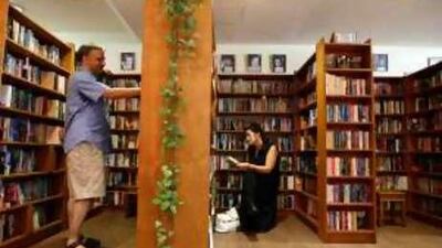 Martin Billington and Susan Walpole browsing books at the House of Prose shop in Jumeirah Plaza in Dubai.