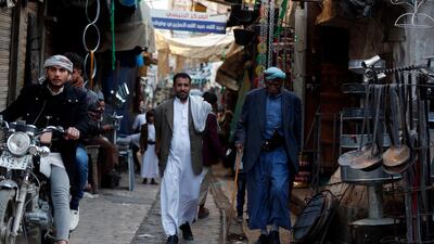 Yemenis walk through a market in the old quarter of Sanaa, Yemen. EPA