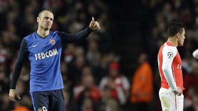 AS Monaco's Dimitar Berbatov, left, gestures after scoring his side's second goal during their 3-1 Champions League win over Arsenal on Wednesday night in London. Matt Dunham / AP / February 25, 2015