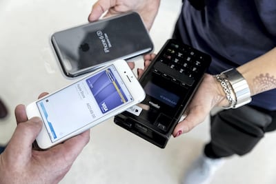 Apple Pay launched in the UAE in October. Antonie Robertson / The National