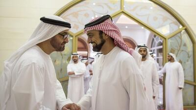 Sheikh Mohammed bin Rashid shakes the hand of Sheikh Ammar bin Humaid Al Nuaimi Crown Prince of Ajman at Mushrif Palace.