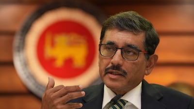 Newly appointed governor of Sri Lanka's central bank Nandalal Weerasinghe says making debt payments has become challenging and impossible. AP