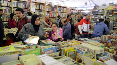 Find bargains galore among the secondhand stalls of Soor Al-Azbakeya t the fair. EPA
