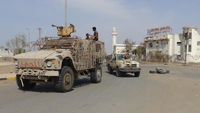 Members of the Yemeni pro-government forces gather at the eastern entrance of the port city of Hodeidah. AFP