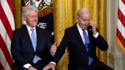 President Joe Biden and former president Bill Clinton have a laugh as Vice President Kamala Harris speaks. AP
