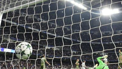 Real Madrid’s Gareth Bale, centre, scores the opening goal. Pierre-Philippe Marcou / AFP