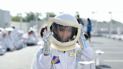 Pupils at Repton School in Abu Dhabi set a new Guinness World Record for the largest gathering of people dressed as astronauts. All photos: Khushnum Bhandari / The National