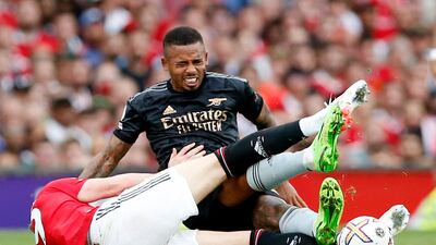 Arsenal's Gabriel Jesus is fouled by Manchester United's Scott McTominay. Reuters