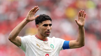 Morocco captain Achraf Hakimi celebrates after their opening goal. Getty Images