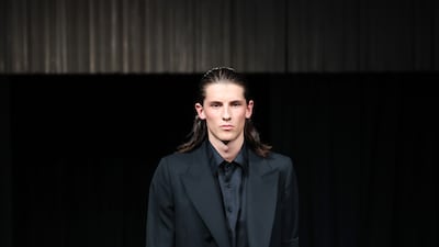 Daniel W Fletcher's show led a minute's silence, when it opened the pre-event evening on Thursday. It was followed with a first look at a mourning suit, with black armband. Getty