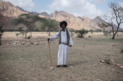 Ali, an inhabitant of Elba poses for a photograph. Photo / Jihad Abaza