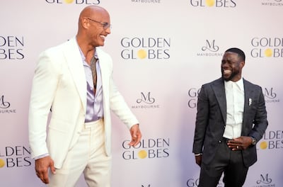 Actors Dwayne Johnson and Kevin Hart on the red carpet at the Golden Globes 2025. AP