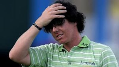 Ireland's Rory McIlory, shown here after his success in this year's Dubai Desert Classic, would much rather win one of golf's four majors than an Olympic medal, says columnist Robert Philip.