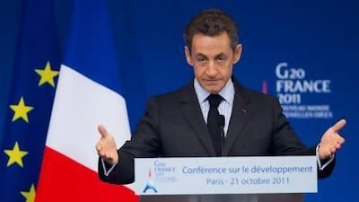 French President Nicolas Sarkozy delivers the opening speech of the G20 conference on development, in Paris, France. Ian Langsdon / EPA