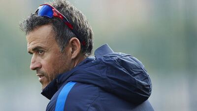 Barcelona manager Luis Enrique leads his team’s training session. Alejandro Garcia / EPA