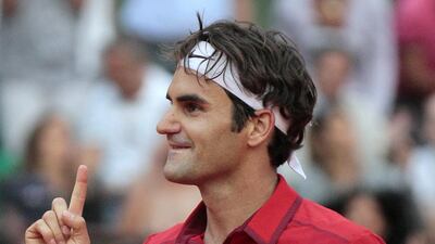 2011 French Open semi-finals: Djokovic entered the match on the back of a 43-game win streak but was unable to get the better of Federer, who won 7-6, 6-3, 3-6, 7-6 to advance to his fifth Roland Garros final before losing to Rafael Nadal. AFP